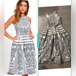 Elliatt Criss Cross Neckline Printed stretchy Dress Size M